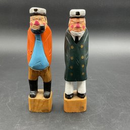 Carved Fishermen Figures