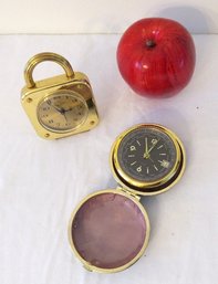 Two Vintage Travel Clocks Including World Clock And Brass Example
