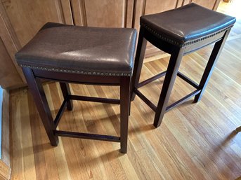 Pair Of Counter Height Stools With Brown Leather And Nail Trim And Wood Legs