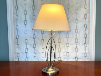 A Brushed Metal Abstract Form Lamp.