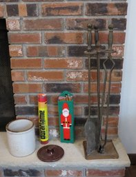 A Set Of Fireplace Tools And Accessories