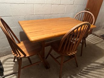Very Heavy And Very Solid Wood Table And 3 Chairs