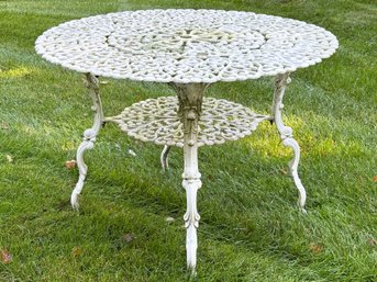 An Antique Cast Aluminum Outdoor Dining Table
