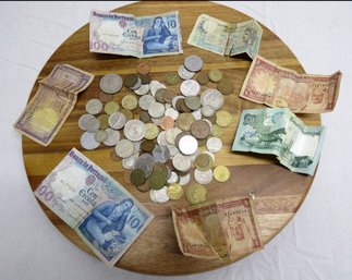 A Mixed Lot Of Foreign Coins And Currency