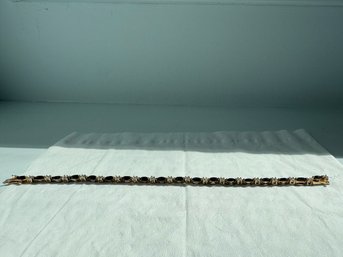 Sterling Silver Tennis Bracelet Featuring Black Gemstones