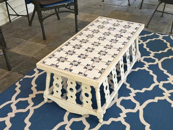 A Vintage Baby Cradle Coffee Table With Tile Top