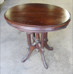 A Victorian Walnut Parlor Table