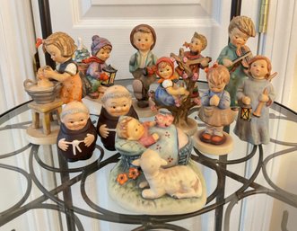Vintage Goebel Hummel Figurine Collection - Set Of 11 (1950s-1990s)