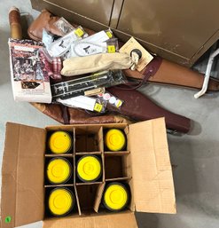 Box Of Clay Pigeons And 3 Gun Cases