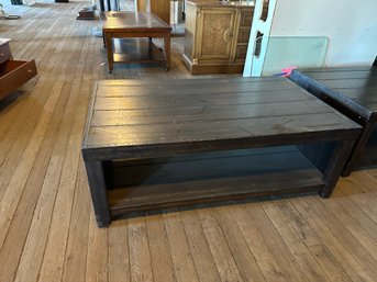Dark Heavy Wood Coffee Table On Wheels