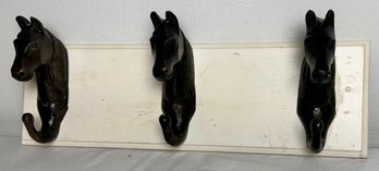Horse Head Hooks Mounted On Board