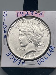 1923-S Silver Peace Dollar. (16)