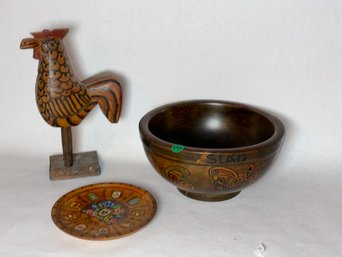 A CELTIC WOODEN BOWL AND A CHICKEN/DUTCH WOOD PLATE
