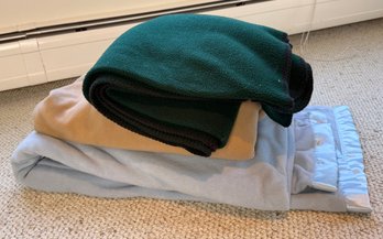 Two Twin Blankets And A Throw