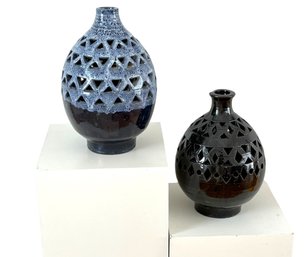 A Pair Of Artisan Made Pierced Ceramic Lanterns