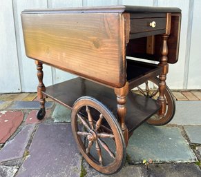 A Vintage Pine Tea Or Bar Cart By Ethan Allen