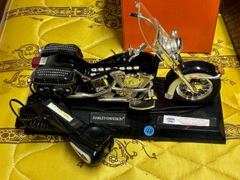 A HARLEY DAVIDSON PHONE AND INTERNATIONAL DOLLS