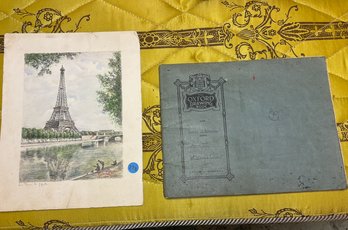 A SIGNED PRINT OF THE EIFFEL TOWER AND A SKETCH BOOK