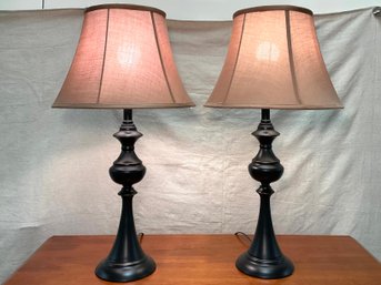 A Pair Of Burnished Metal Table Lamps