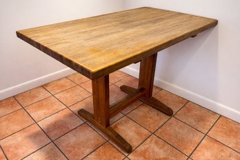 Charming Farmhouse Butcher Block Dining Table With A Trestle Base And Breadboard Edge