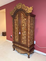 Stunning Vintage Hand-Carved Balinese Armoire Cabinet With Gilded Detailing