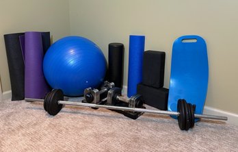 Assortment Of Yoga And Work Out Equipment