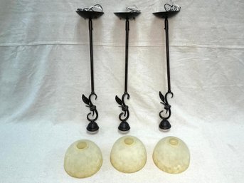 A Set Of Three Pendant Lights