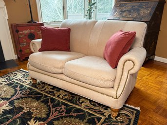 Quality Leathercraft Rolled Arm Taupe Love Seat With Nailhead Detail