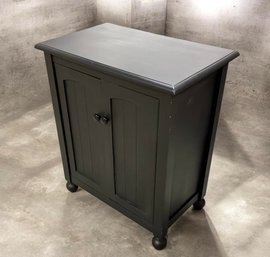 Black Painted Two-Door Wood Storage Cabinet With Interior Shelves