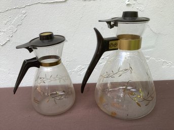 Pair Of Tricolette Flameproof Glass Carafes