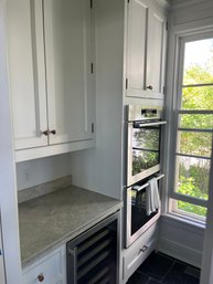 A Small Grouping Of Crafted Cabinets - Appliance Pantry