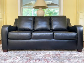 A Queen Sleeper Sofa In Chic Vegan Leather