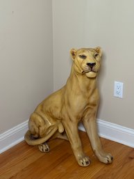 A Large Ceramic Mountain Lion Statue