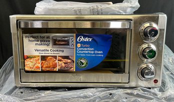 OSTER Countertop Convection Oven Model TSSTTVF817. New In Box.