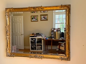 A Very Large Extraordinary Gilded Ornate Beveled Mirror