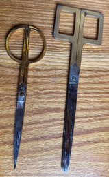 Two Pairs Of Cool Scissors