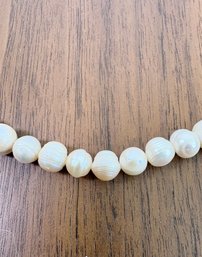 Natural Strand Cultured Pearls With Lustrous White Sheen