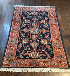 A Vintage Heriz Wool Hand Knotted Area Rug