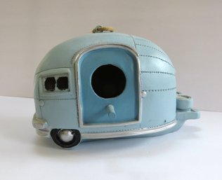 A Painted Resin Blue Camper Birdhouse