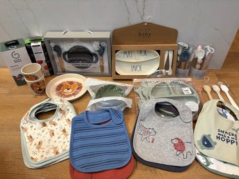 Baby Items Including Bibs, Spoons And Dishes