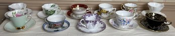 Eleven Tea Cups And Saucers