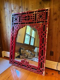 Decorative Wall Mirror Features An Ornate Red Lacquered Geometric Fretwork Frame