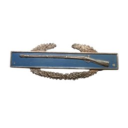 (B188) Sterling Silver Flintlock And Wreath Painted Blue Brooch