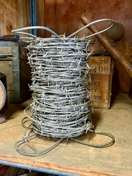 Spool Of Ranchers Barbed Wire .