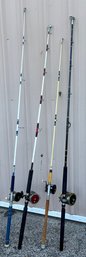 Four  Fishing Rods With Penn Reels.