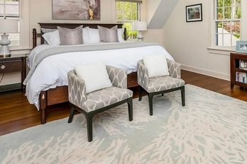 A Pair Of West Elm Grey Ikat Small Barrel Chairs
