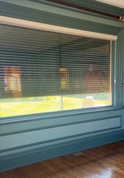 A Pair Of Motorized Exterior Mount Metal Storm Shutters - 99 Inches Wide