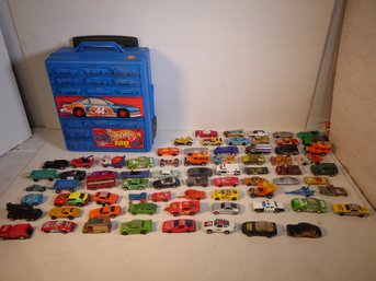 LOT OF 74 MATCHBOX, HOTWHEELS, AND OTHER DIECAST VEHICALS WITHE CARRING CASE.