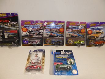 Lot Of Seven Johnny Lightning And Other Diecast Cars On Cards