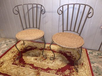Pair Of Wrought Iron Chairs With Caned Seats